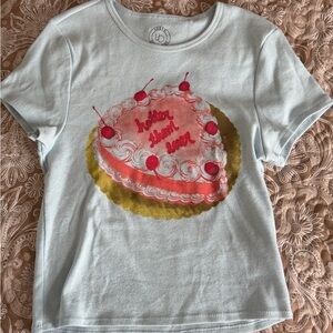 Urban Outfitters Light Blue Baby Tee with Cake Graphic
